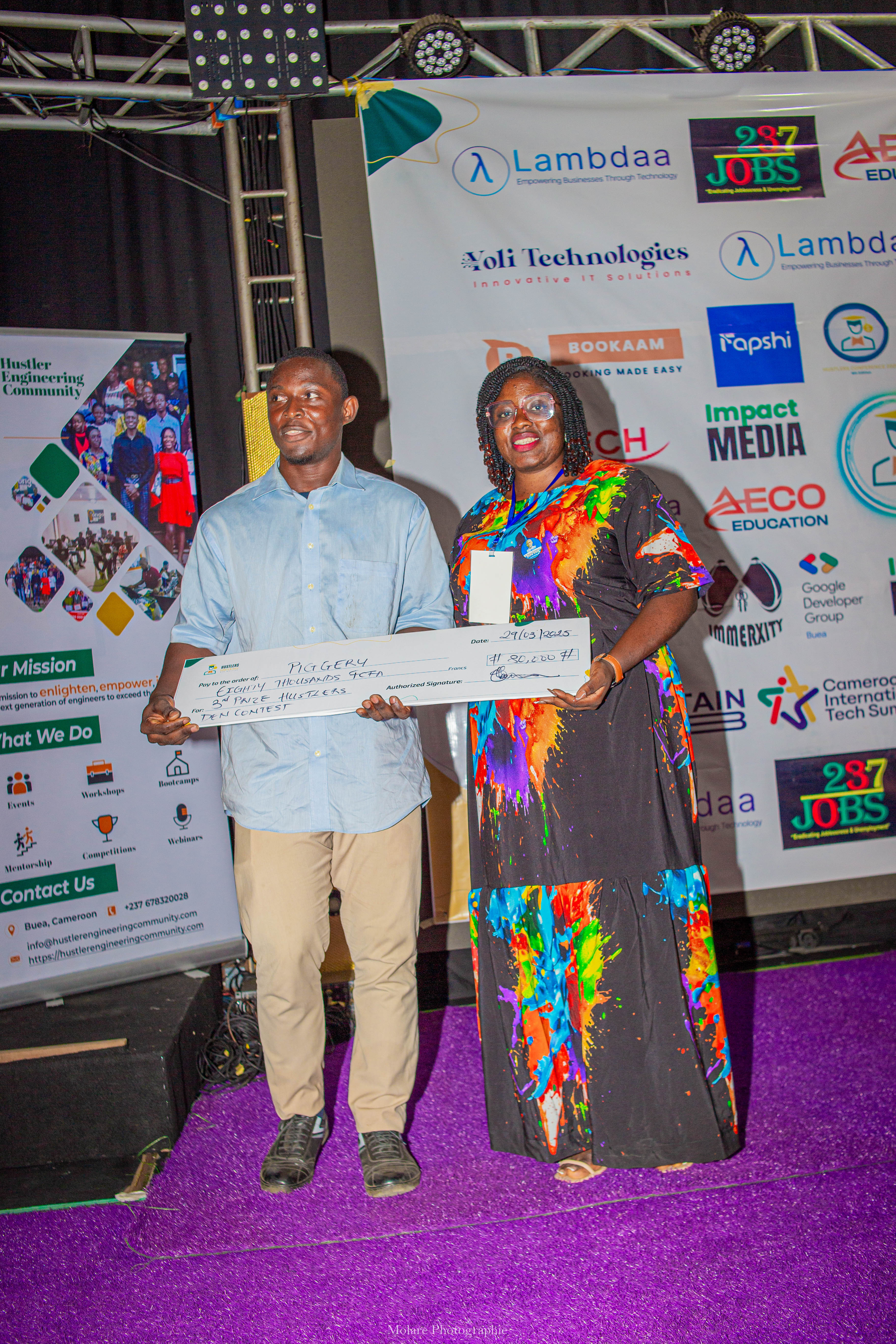Piggery receiving third prize for the Hustlers Den contest