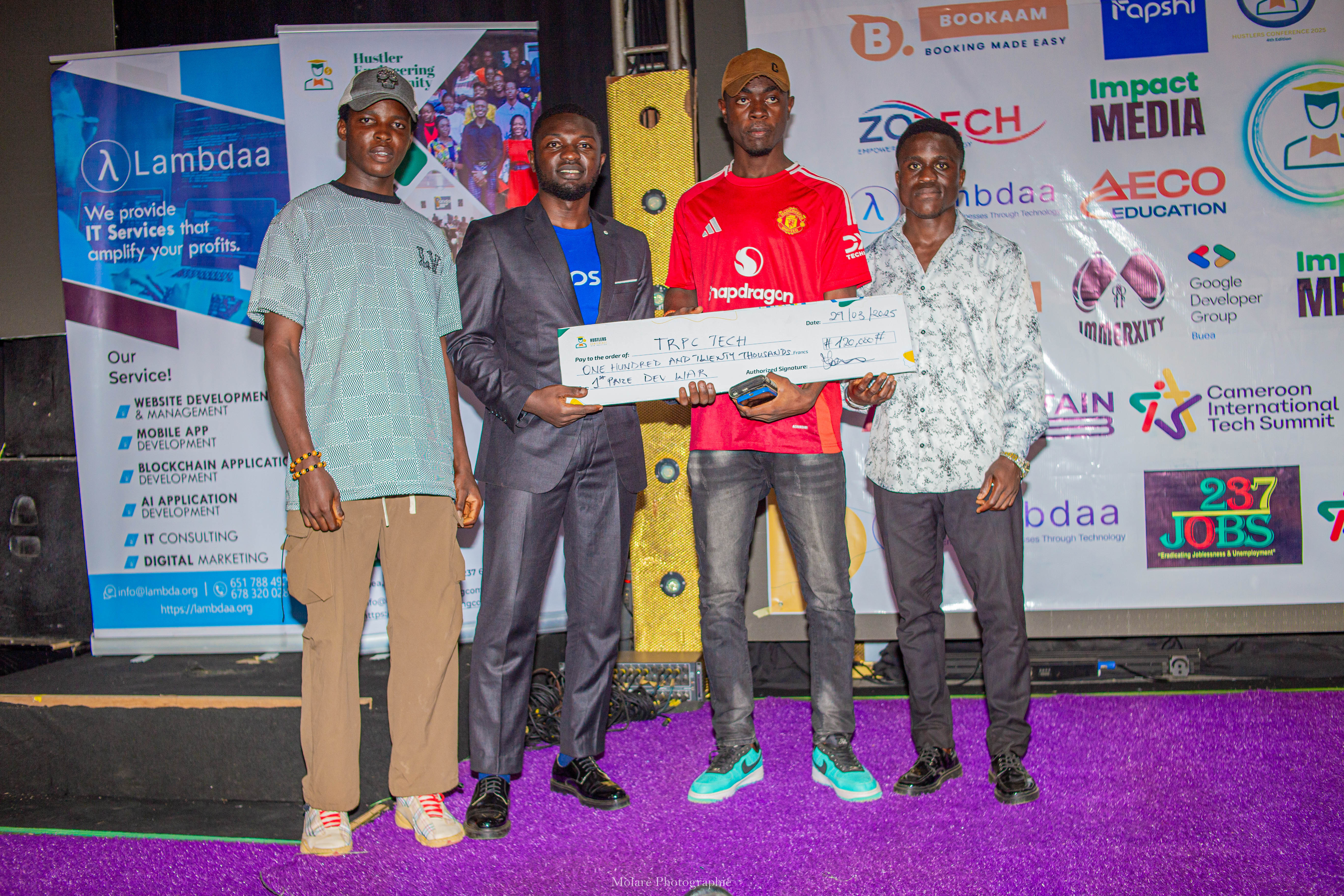 Dev War winners on stage